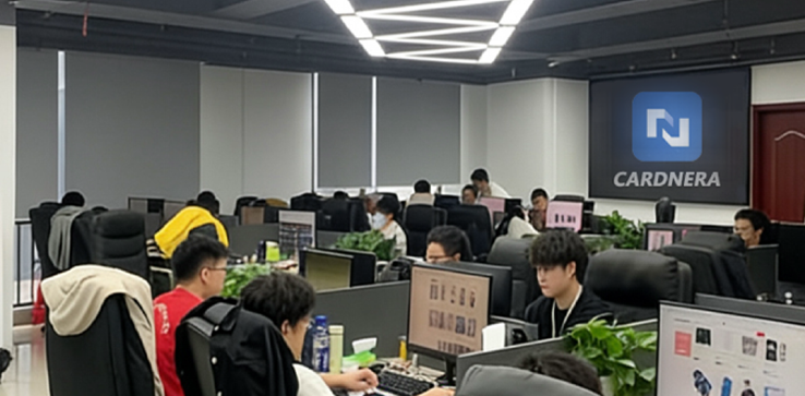 Cardnera office environment showing dedicated team members working in a modern workspace